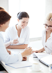 Image showing businesswoman with team on meeting in office