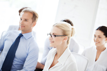 Image showing businessmen and businesswomen on conference