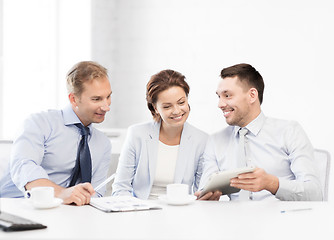 Image showing business team having fun with tablet pc in office