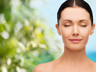 Image showing young calm woman with closed eyes