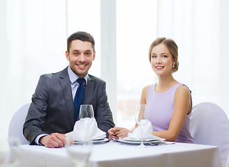 Image showing smiling couple at restaurant