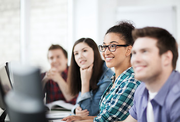 Image showing students with computers studying at school