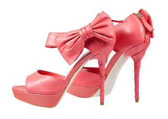 Image showing Pink shoes with a bow on a high heel 