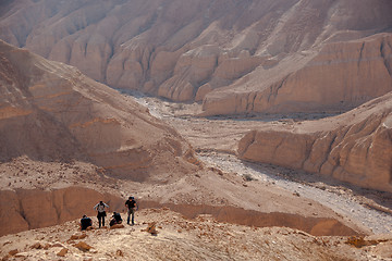 Image showing Tourists hiking in dead sea mountains