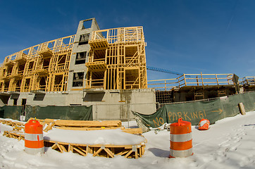 Image showing wood stud construction with snow around