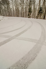 Image showing snow covered road and trees after winter storm