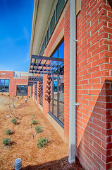 Image showing brick building architecture with suncreen shades on windows