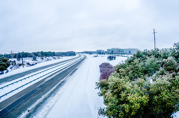 Image showing highway covered in snow and sleet without traffic