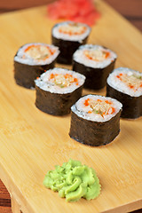 Image showing sushi rolls with tobico and pancake