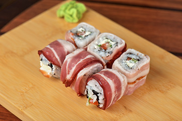 Image showing Sushi roll with bacon