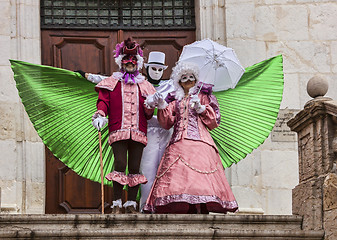 Image showing Three Disguised Persons