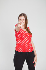 Image showing Attractive woman pointing