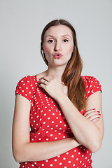 Image showing Attractive woman blowing kiss