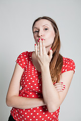 Image showing Attractive woman blowing kiss