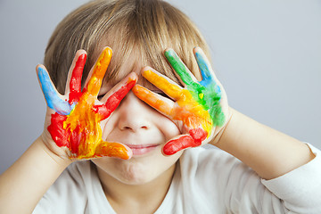 Image showing hands painted  in colorful paints