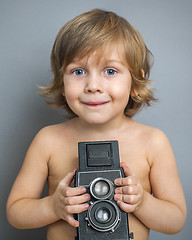 Image showing boy with an old camera