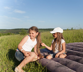 Image showing Camping sisters