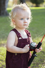 Image showing Cute Young Boy With Fishing Pole at The Lake