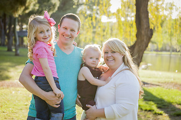 Image showing Young Attractive Family Portrait in the Park