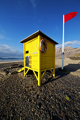 Image showing lifeguard chair red flag  coastline and summer 