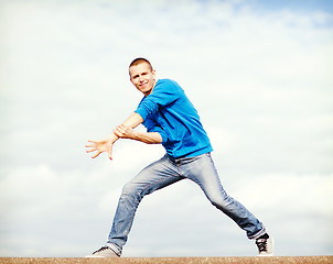 Image showing handsome boy making dance move