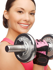 Image showing asian sporty woman with heavy dumbbell