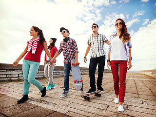 Image showing teenagers with skates outside