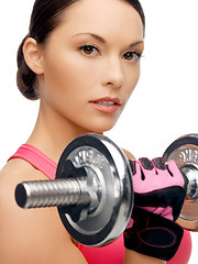 Image showing asian sporty woman with heavy dumbbell