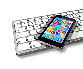 Image showing Smartphone on Computer Keyboard