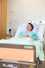 Image showing Thoughtful Patient Lying On Bed In Hospital