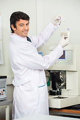 Image showing Male Scientist Analyzing Blood Samples