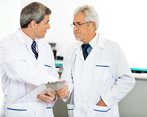Image showing Researchers Shaking Hands