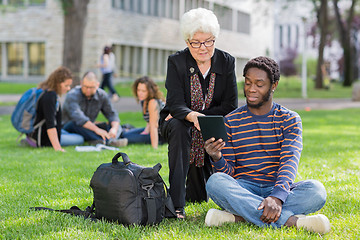 Image showing College Professor helping Student