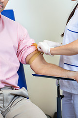 Image showing Nurse Preparing Patient For Blood Test