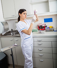 Image showing Technician Analyzing Blood Sample