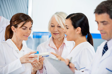 Image showing Researchers Analyzing Medicine