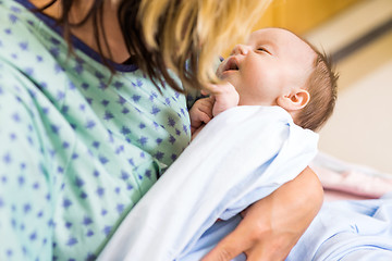 Image showing Babygirl Being Carried By Mother In Hospital