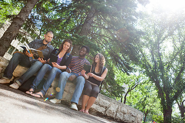 Image showing Students Studying On Parapet At University Campus