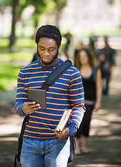 Image showing Student Using Digital Tablet On Campus