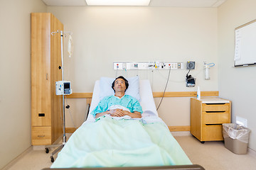 Image showing Patient Reclining On Bed While Looking Up In Hospital