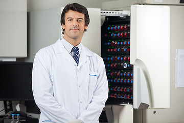 Image showing Researcher Standing By Blood Culture Instrument