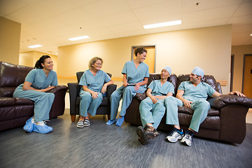 Image showing Medical Team Conversing In Hospital's Waiting Room