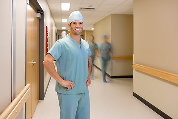 Image showing Surgeon With Team Walking At Hospital Corridor