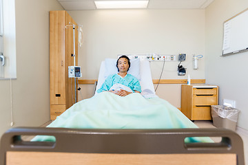 Image showing Portrait Of Male Patient Reclining On Hospital Bed