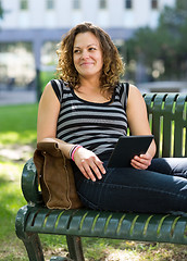 Image showing Thoughtful University Student Relaxing On Bench