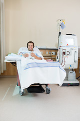 Image showing Patient Listening Music While Receiving Renal Dialysis