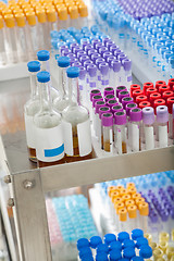 Image showing Test Tubes And Bottles On Trolley