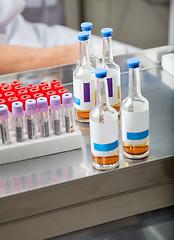 Image showing Test Tubes And Sample Bottles In Lab