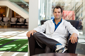 Image showing Confident Male Doctor Sitting On Chair