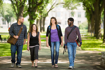 Image showing Friends Walking On Campus Road